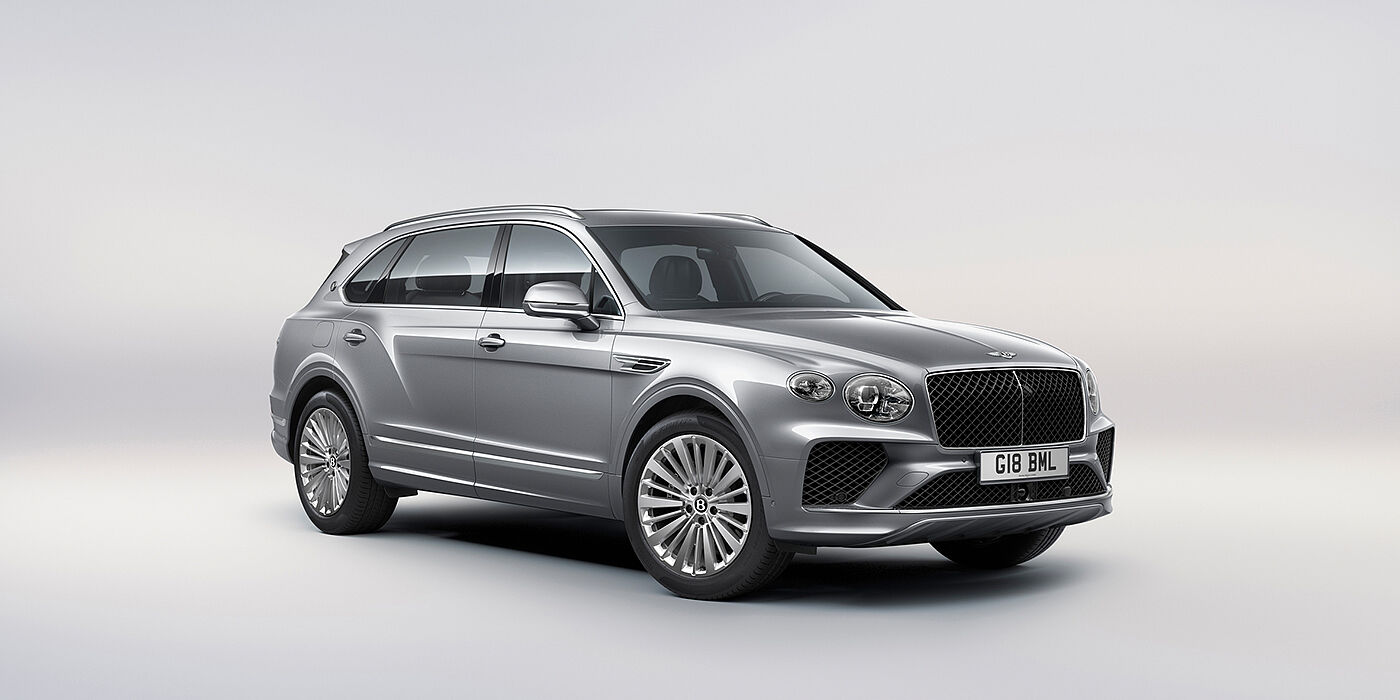 Bentley San Juan Bentley Bentayga Extended Wheelbase luxury SUV front three quarter view in Moonbeam paint with 21 inch five spoke painted wheels
