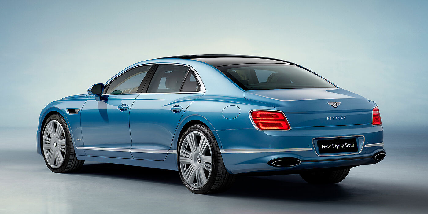 Bentley San Juan New Bentley Flying Spur Azure sedan rear view in Light windsor blue by Mulliner paint with 22 inch Azure wheels and chrome exterior details