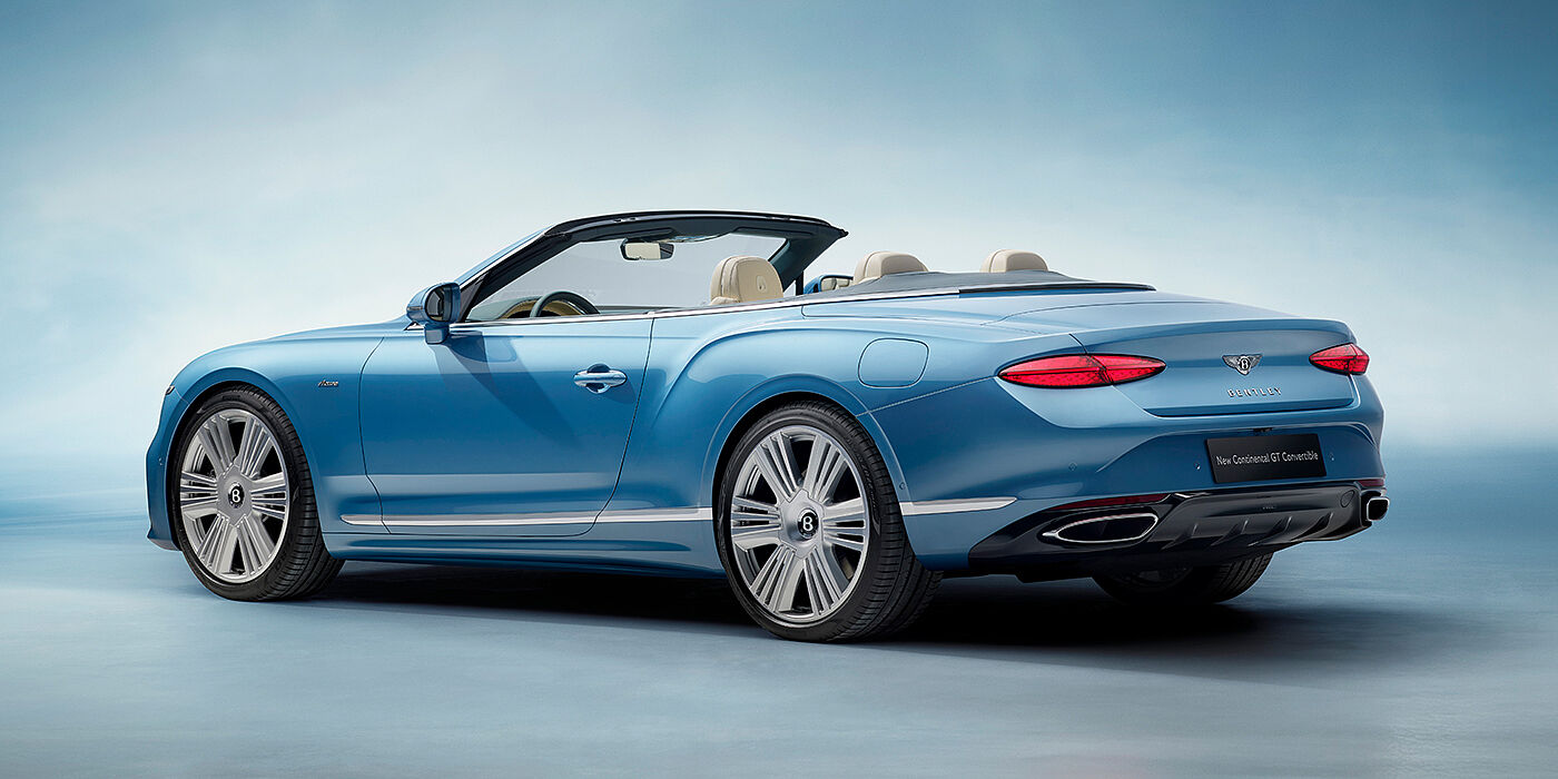 Bentley San Juan New Bentley Continental GTC Azure convertible rear view in Light Windsor blue paint with 22 inch ten spoke wheels and chrome exterior details